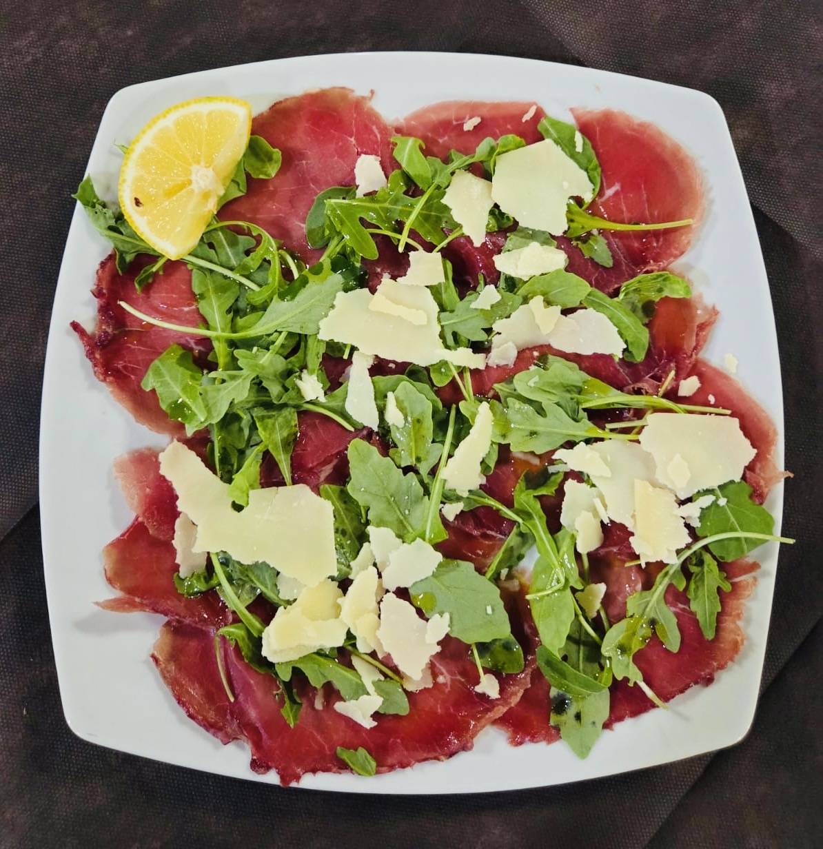 Carpaccio di bresaola rucola e grana